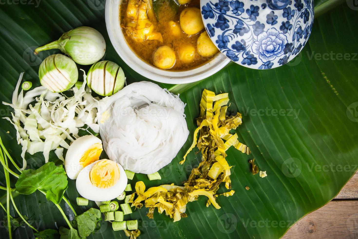 Local Rice vermicelli and curry sauce with vegetable Kanom Jeen Nam Ya photo