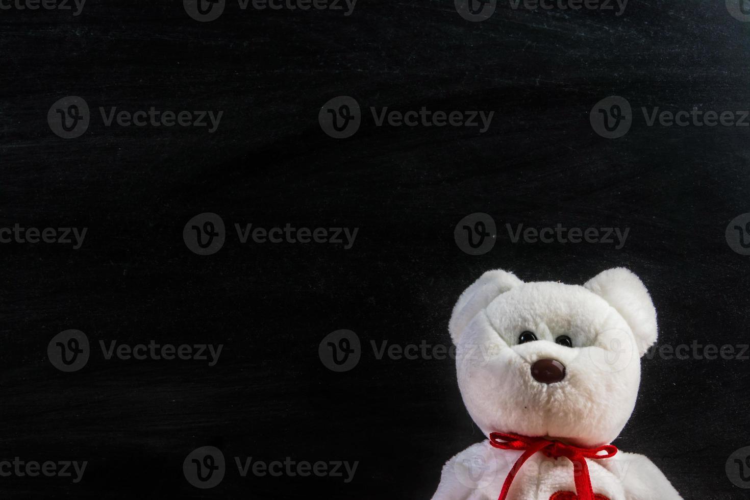 teddy bear with blackboard , background photo