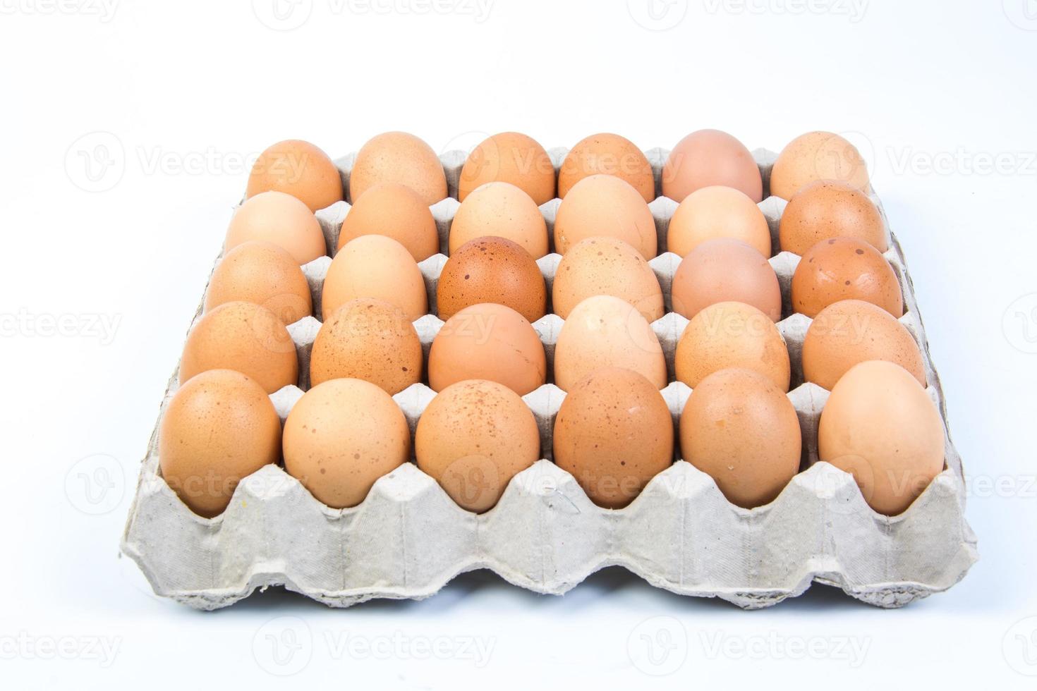 Egg in an egg crate on white background 8118704 Stock Photo at Vecteezy