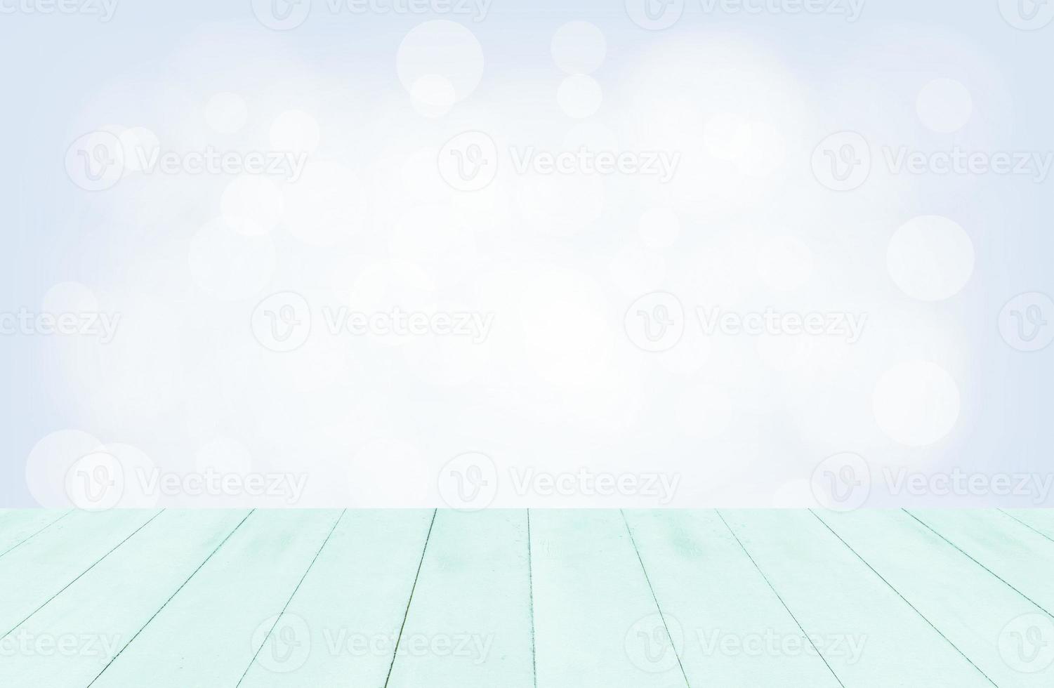 Wooden board empty table in front of blurred blue background. photo