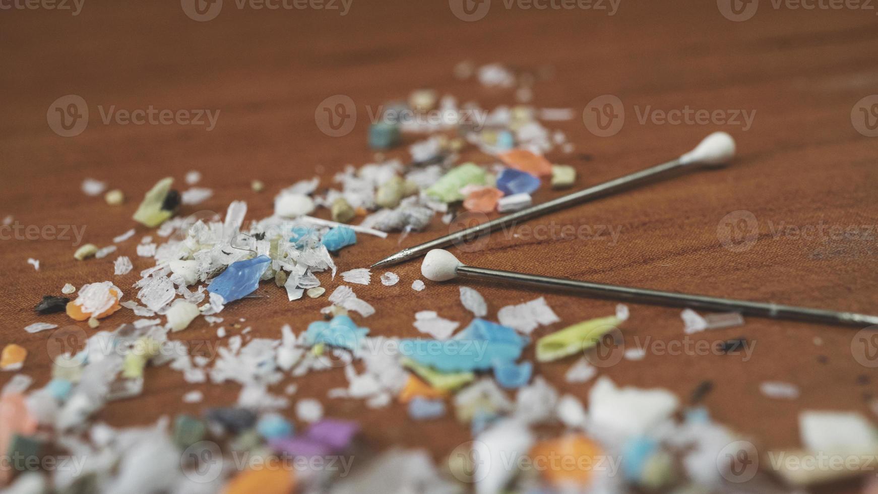 Macro shot of microplastics. Concept for water pollution and global warming.  Climate change idea. Soft focus on a bunch of microplastic that cannot be recycled photo