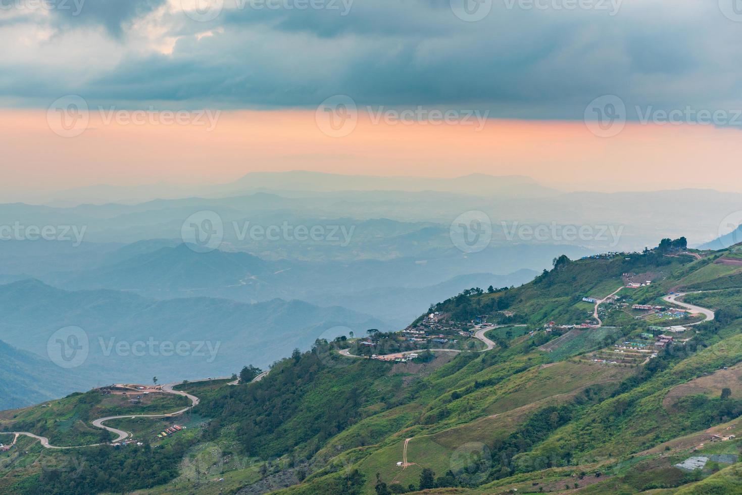 The road and the houses in the valley taken from above. photo