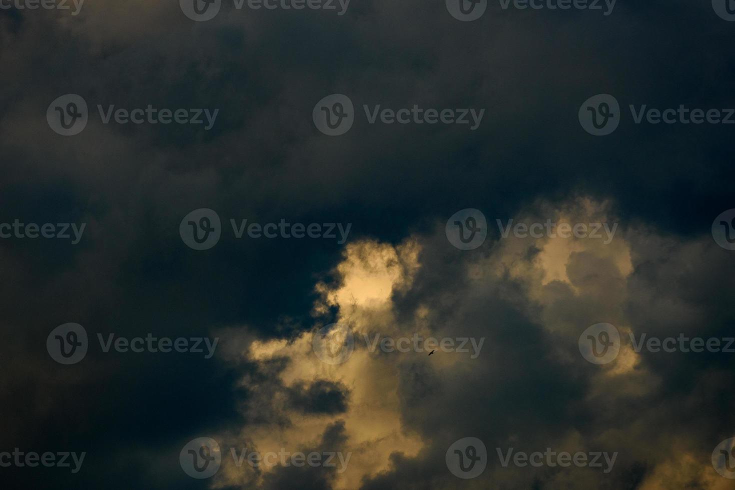 the sky is full of dense clouds photo