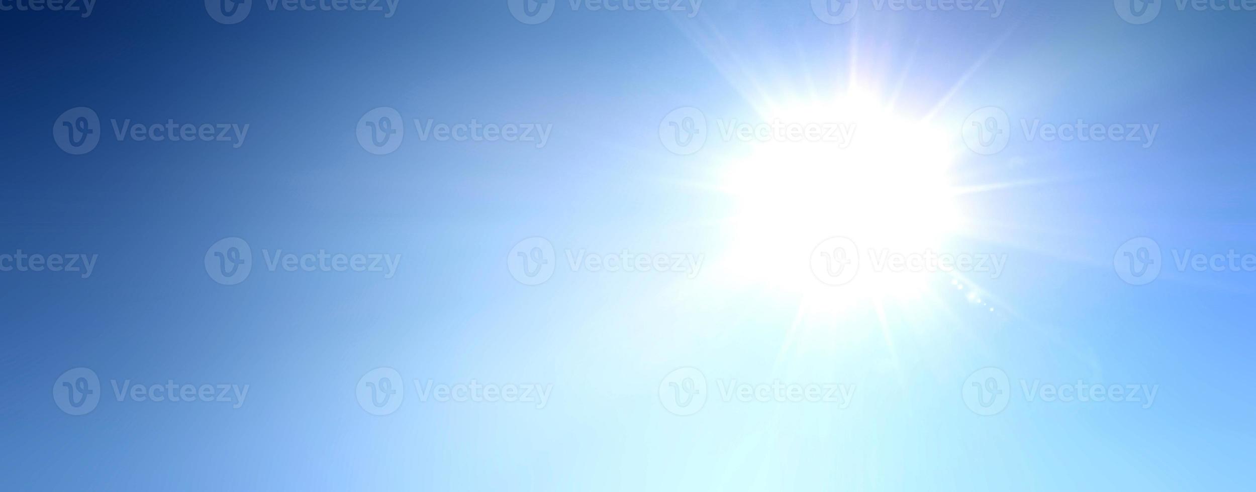 Blue sky during a sunny day with sunlight. photo