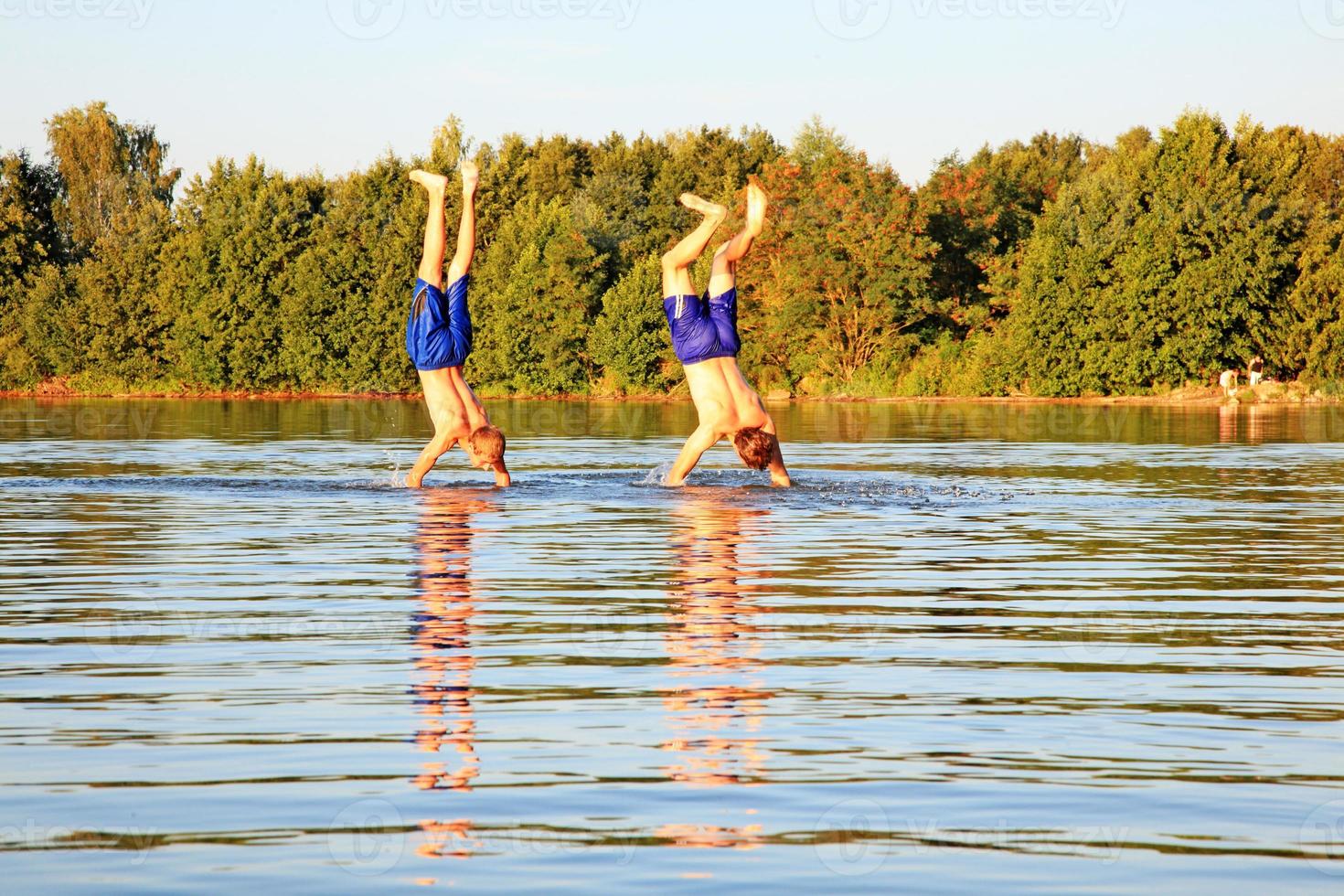 Group of friends having fun on the beach. photo