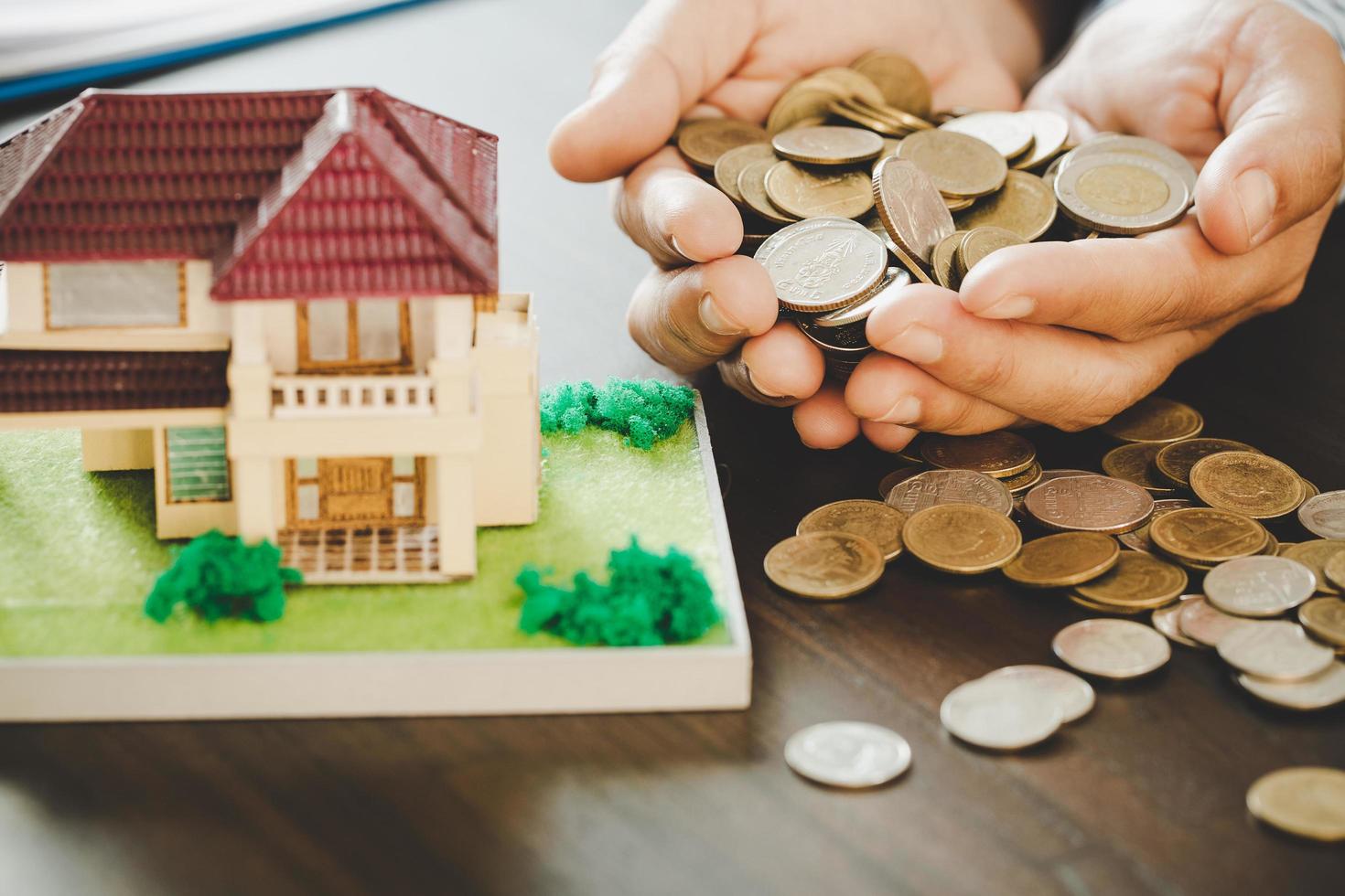House model with money coins photo