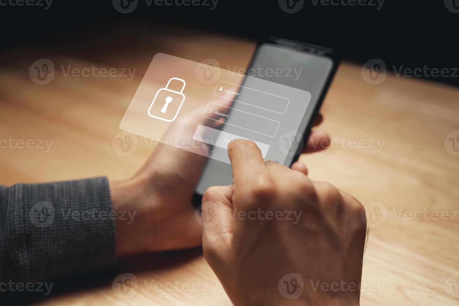 Businessman protecting personal data on smartphone with Login virtual interfaces. Lock icon and internet network security technology. Cybersecurity and privacy concepts. photo