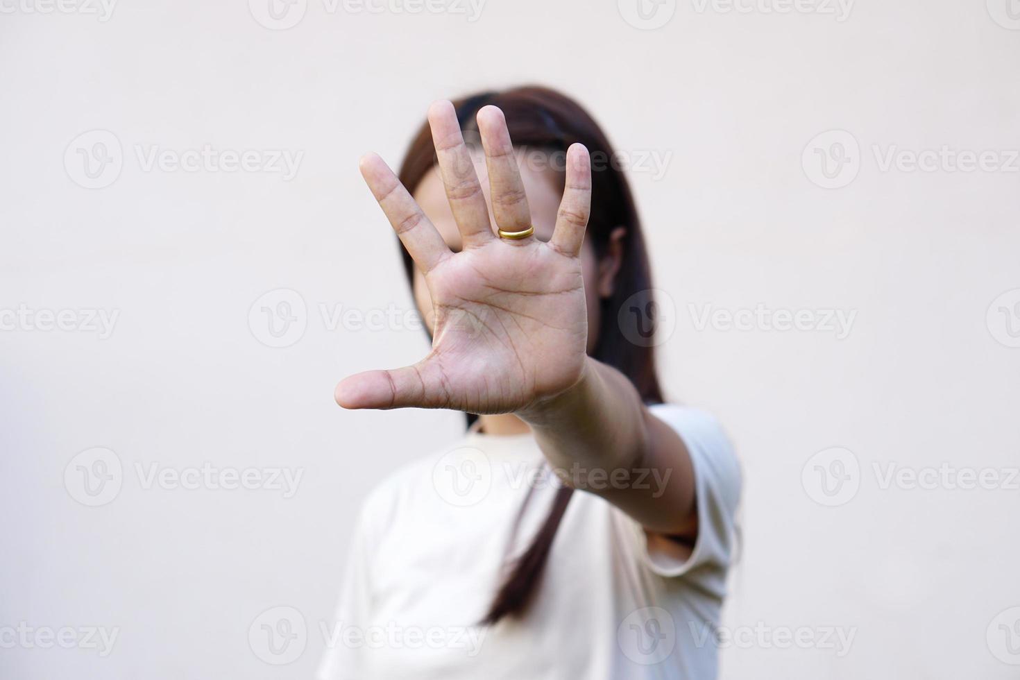 Woman raised her hand for dissuade, campaign stop violence against