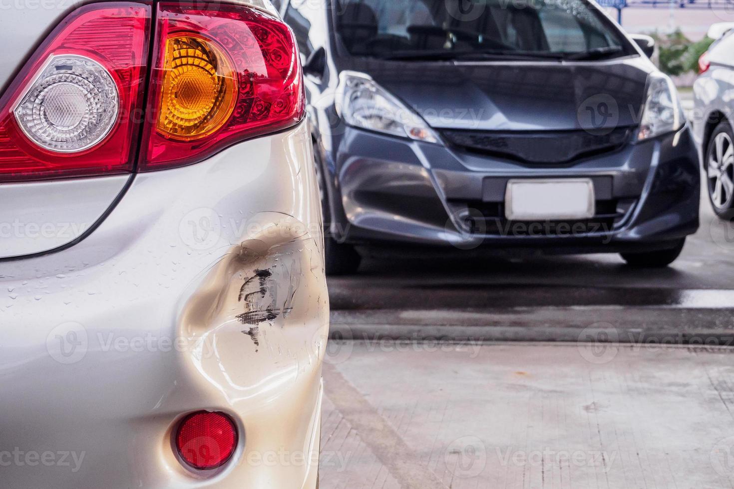 car has dented rear bumper damaged after accident photo