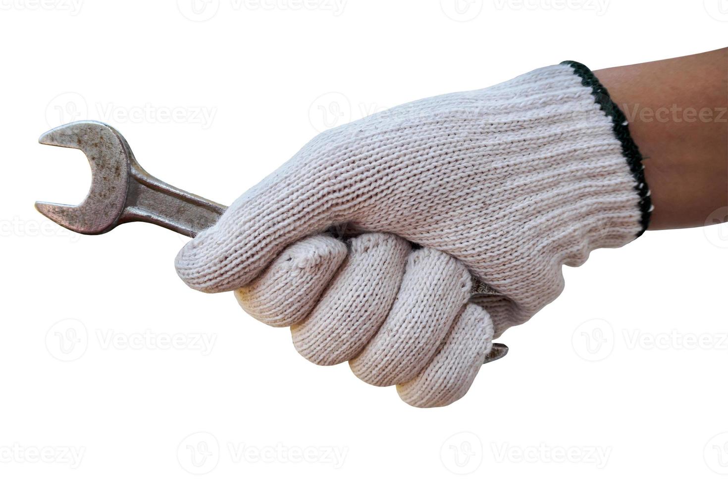 Mechanic hand hold wrench tool in hand isolated on white photo