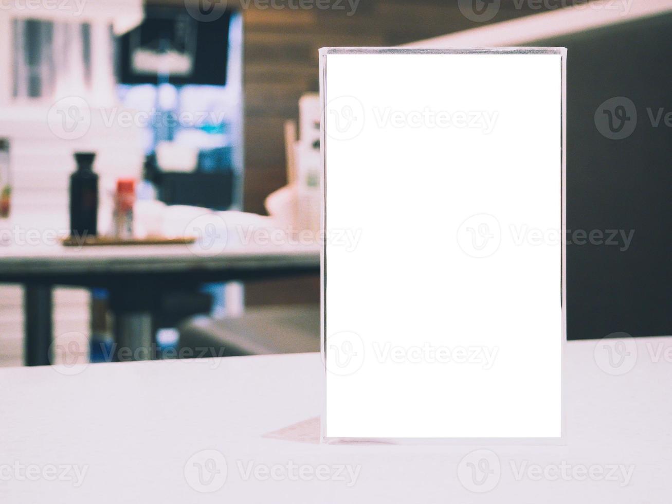 Blank Menu frame on Table in cafe restaurant photo