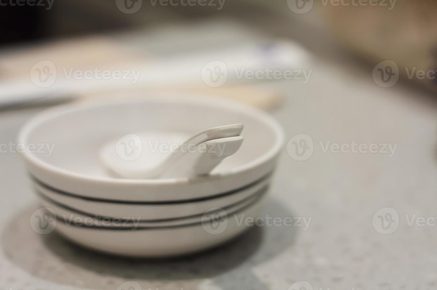 Japanese restaurant table with empty dish photo