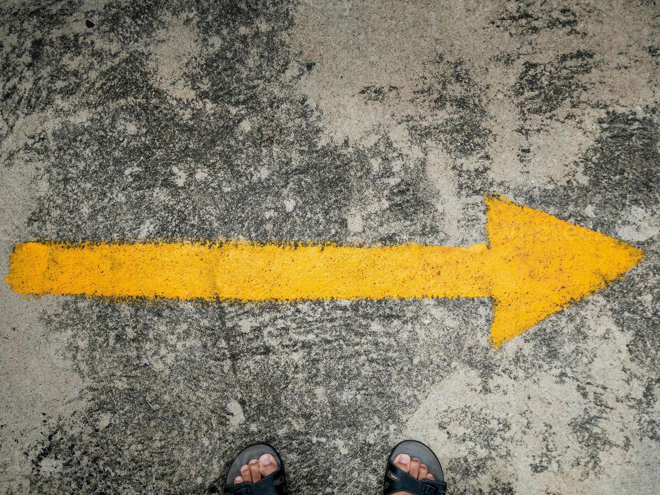 traffic direction arrow on the road photo