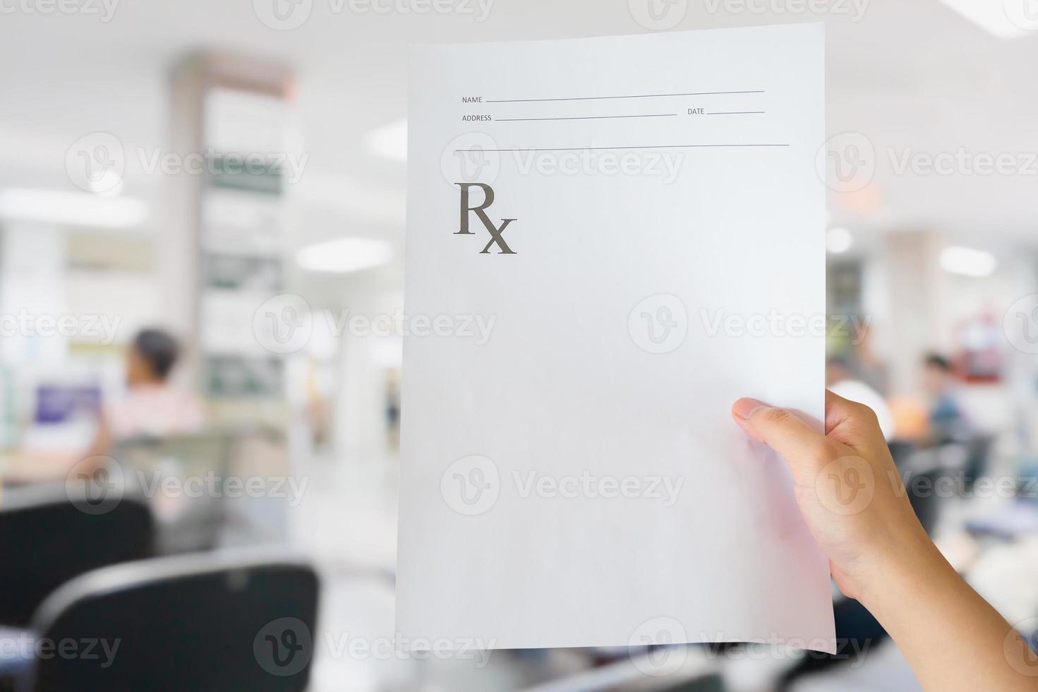 hand hold medical prescription at the hospital photo