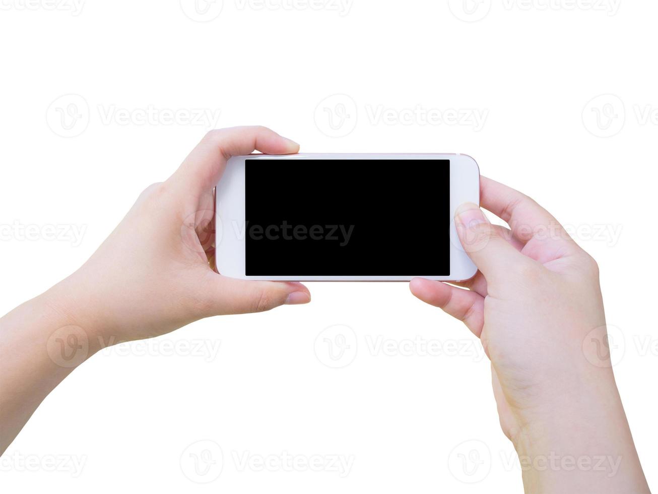 Hand holding smart phone isolated on white background photo