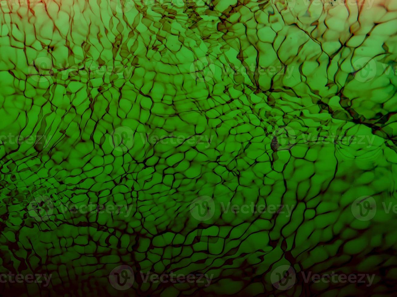 Defocus blurred transparent blue colored clear calm water surface texture with splashes and bubbles. Trendy abstract nature background. Water waves in sunlight. Blue water background. photo