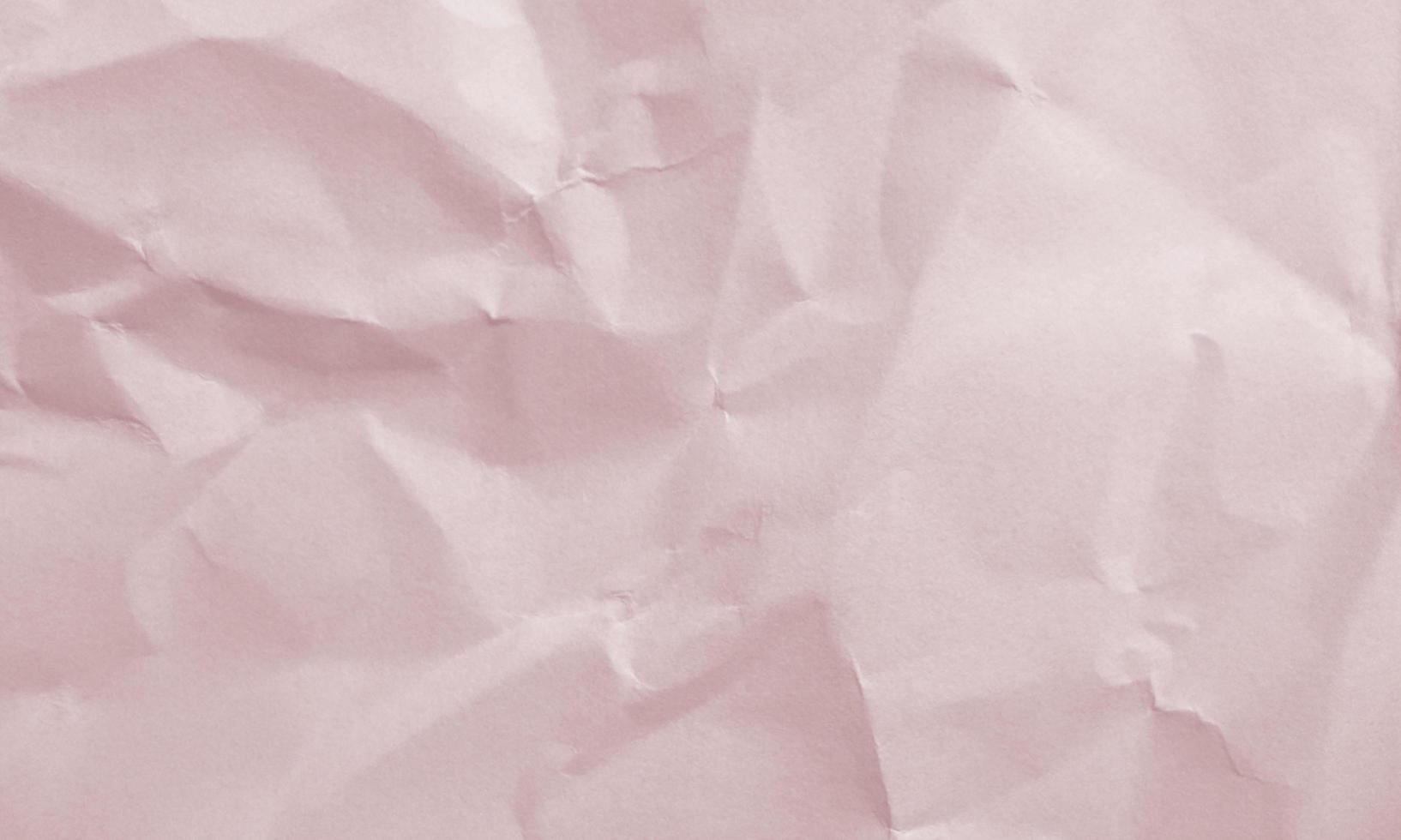crimson colored crumpled paper texture background for design, decorative. photo