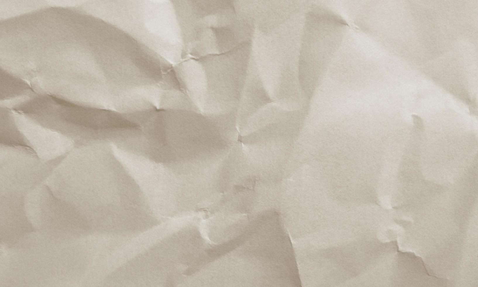 walnut colored crumpled paper texture background for design, decorative. photo