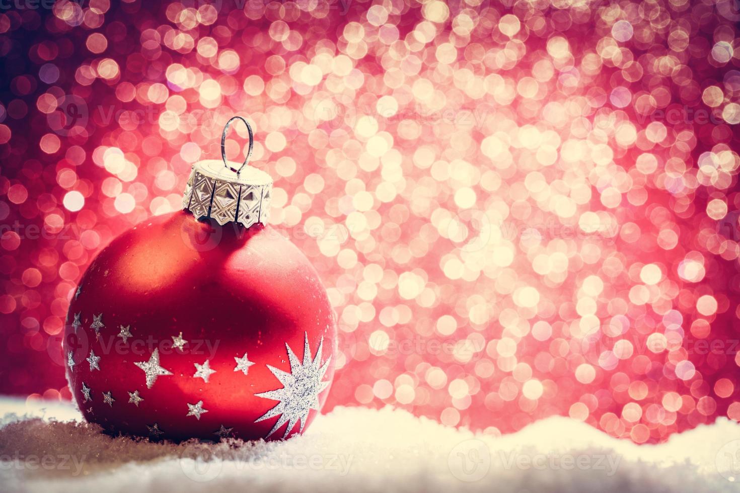Christmas glass ball in snow. Glitter background 8130010 Stock Photo at ...