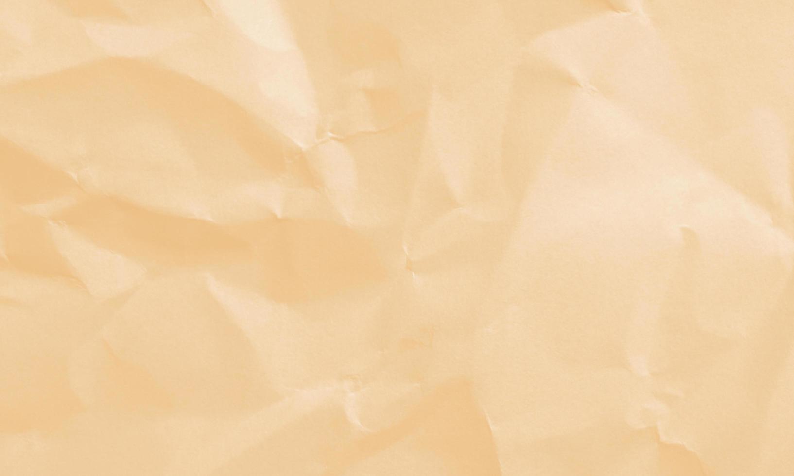 more mustard colored crumpled paper texture background for design, decorative. photo