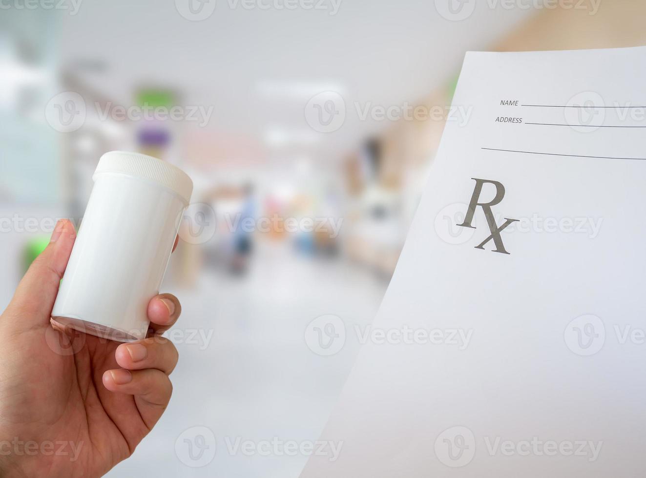 hand hold medical prescription at the hospital photo