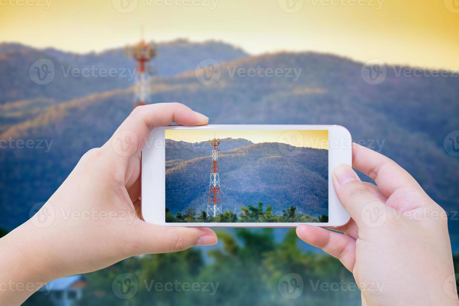Taking photo of Telecommunication tower on the field
