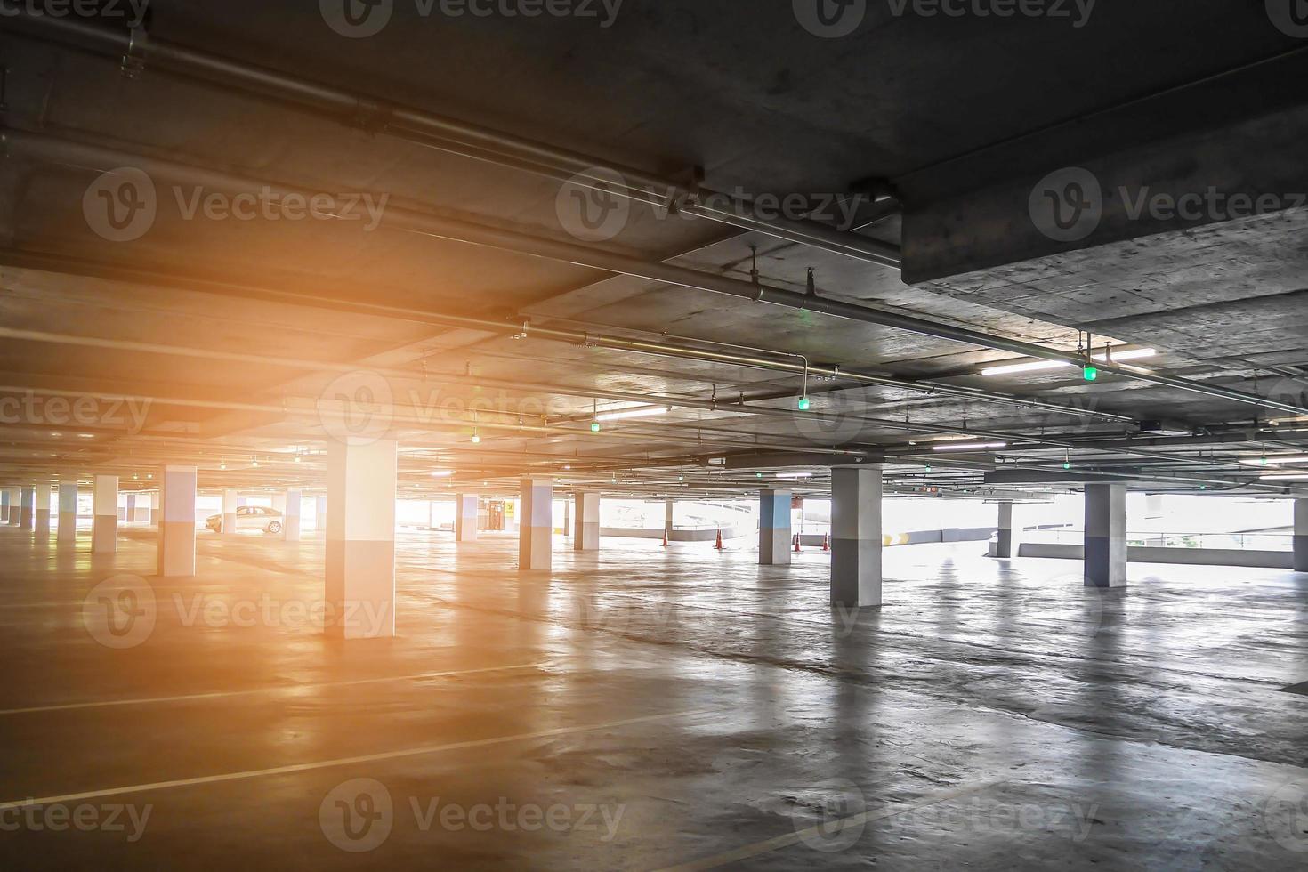 interior of empty vacant car parking garage in department store photo