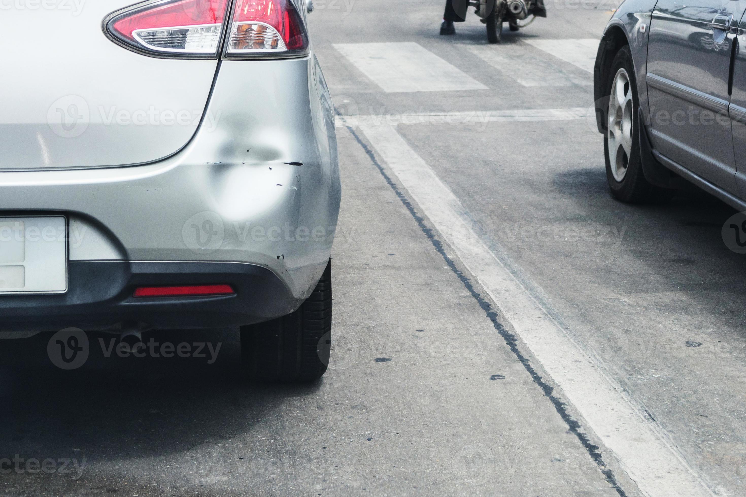 Backside of car has dented rear bumper damaged after accident 8130901