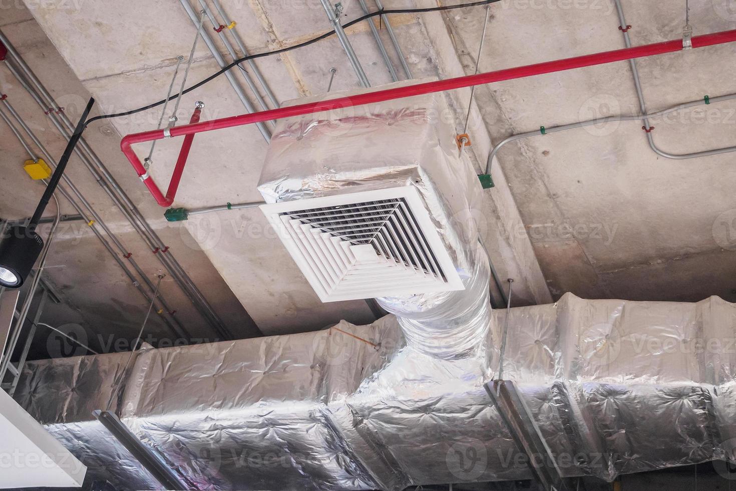Ceiling air duct in large shopping mall photo
