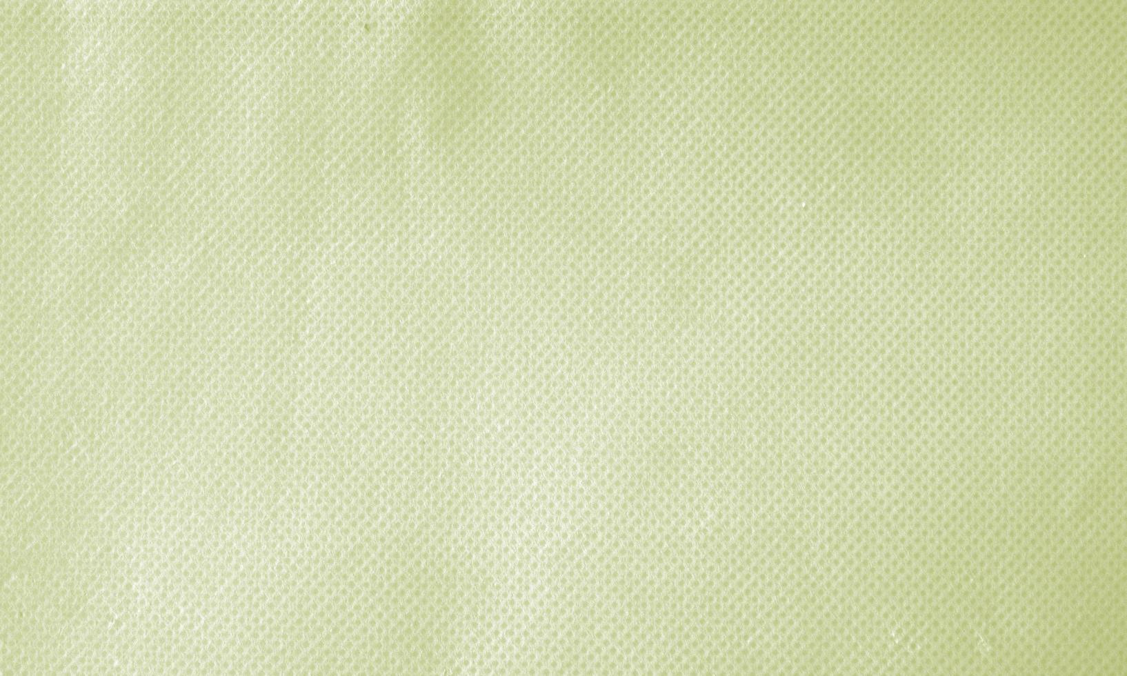 Cream wrinkled fabric texture for background photo