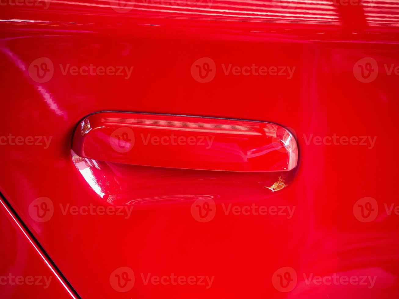 Red car door handle photo