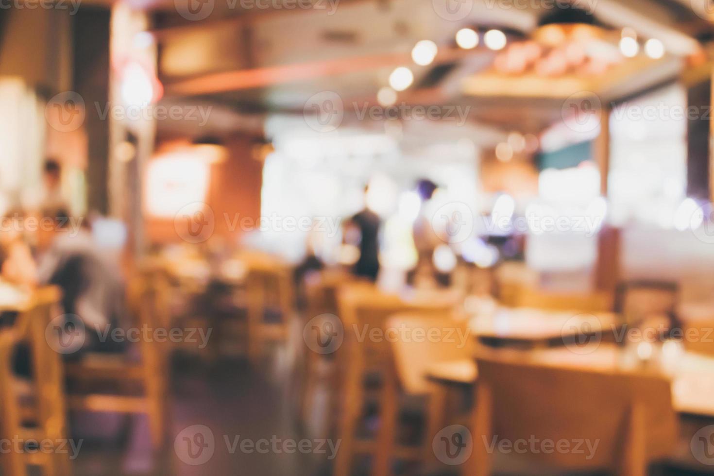 Restaurant cafe or coffee shop interior with people abstract blur background photo