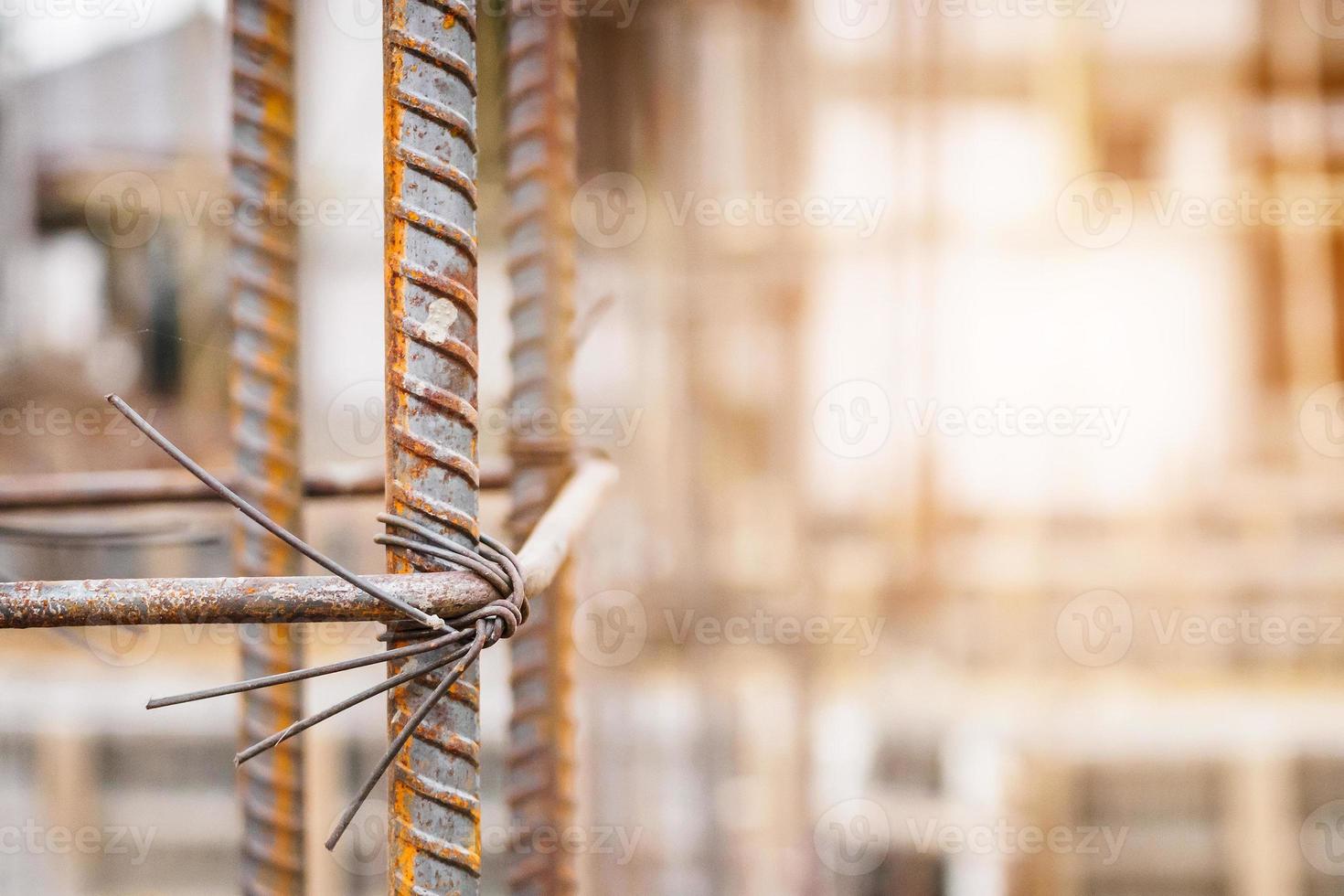 House building construction site with rebar steel to reinforced concrete photo