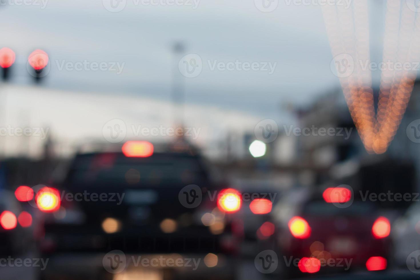 blurred of car on road with bokeh light photo