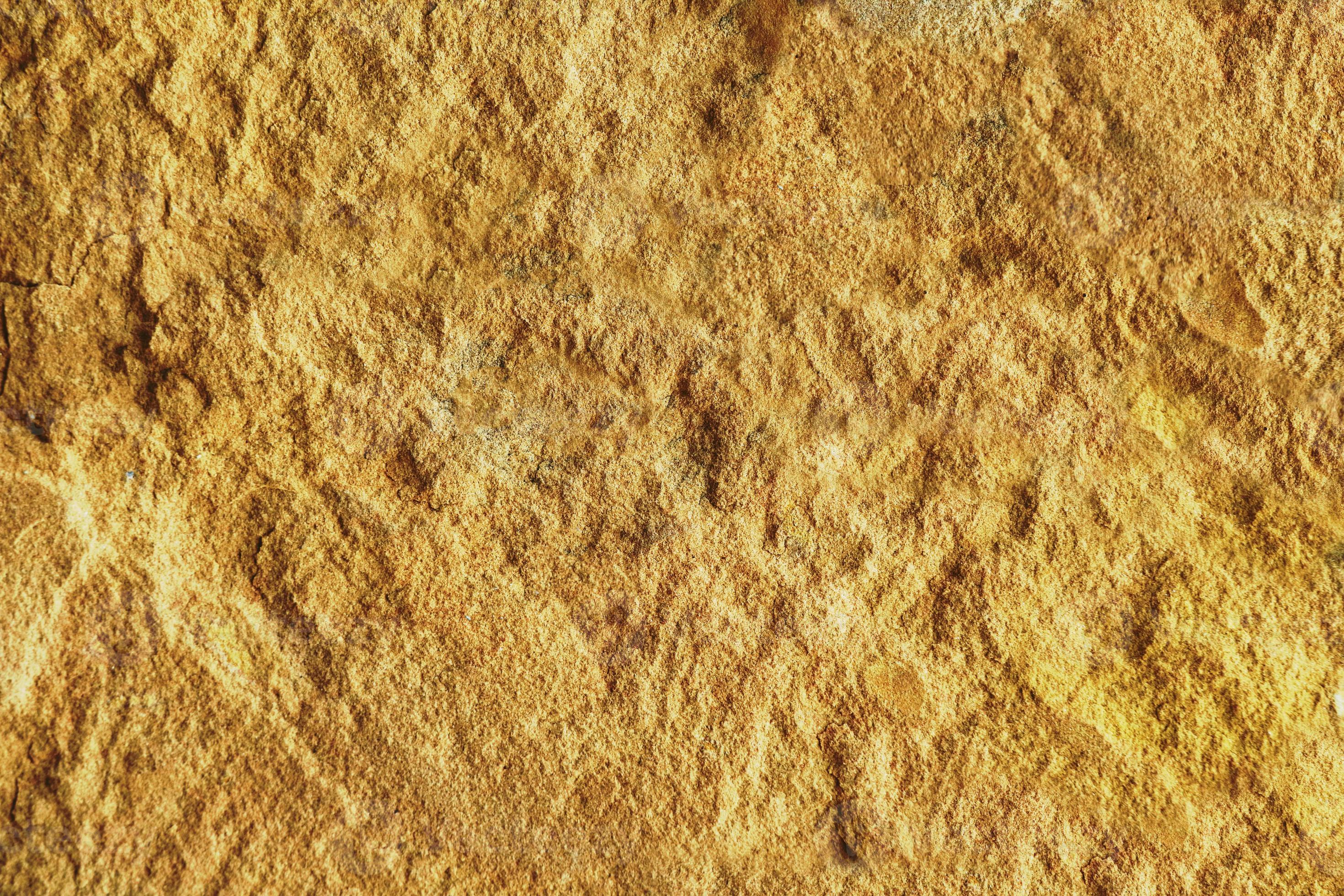 Hard rough top of sandstone wall texture background. outdoor sandstone