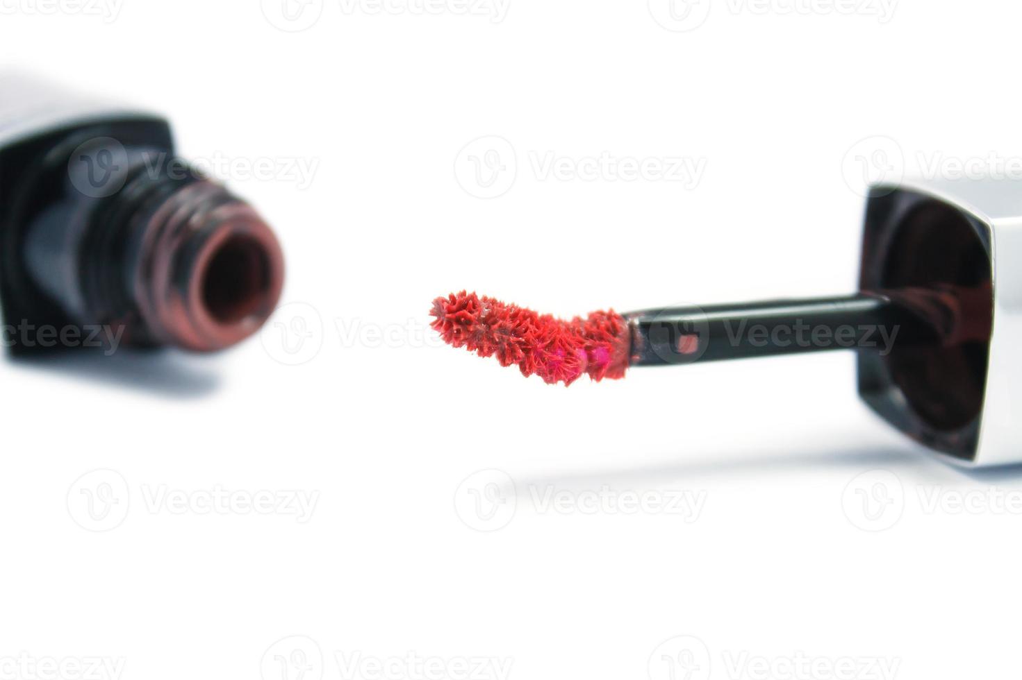 Lip gloss isolated on a white background photo