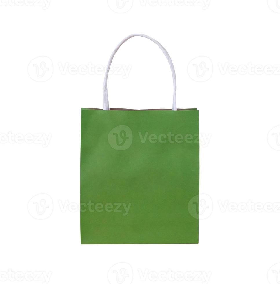 Green paper shopping bag isolated on white background with clipping path photo