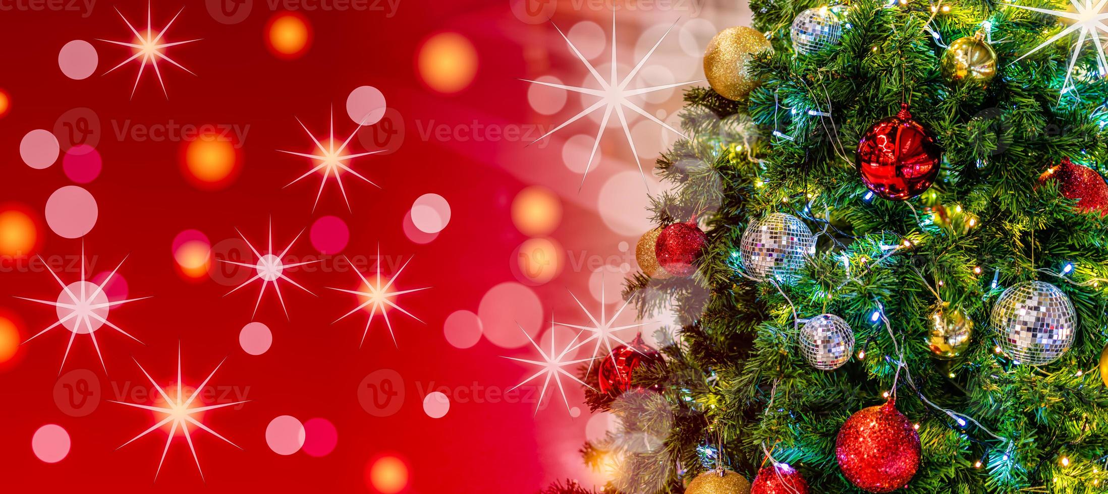 Christmas Tree In Bokeh and blur Background. Ornament And Abstract Defocused Lights. Concept Christmas Day, happy, highlights, holiday, light, merry, new year, night, season 2023. Copy space on left. photo