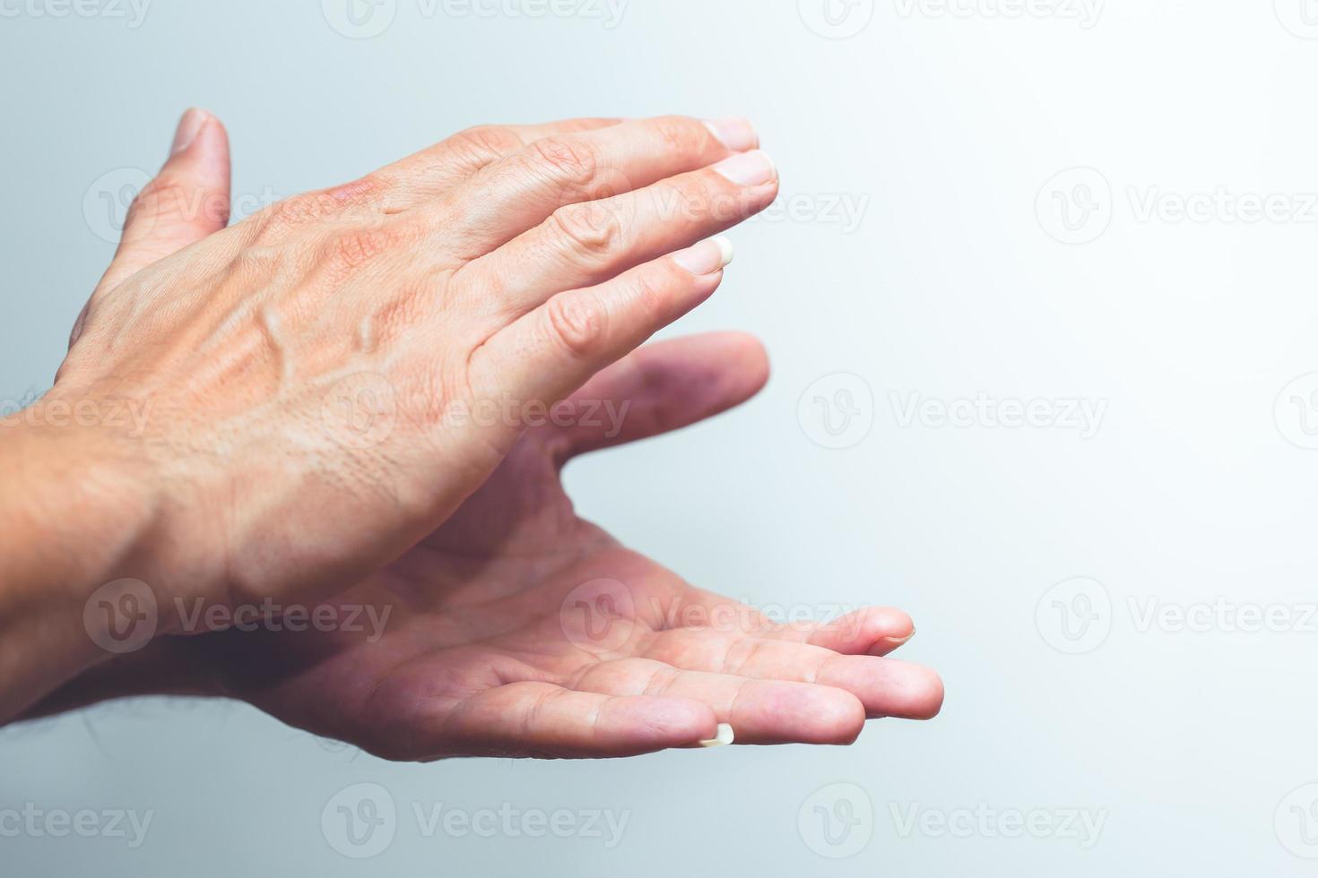 World encouragement campaign Clap For Our Careres to Medical team fight with Covidvirus.Closeup male hand applause with doctor and nurse overlay. photo