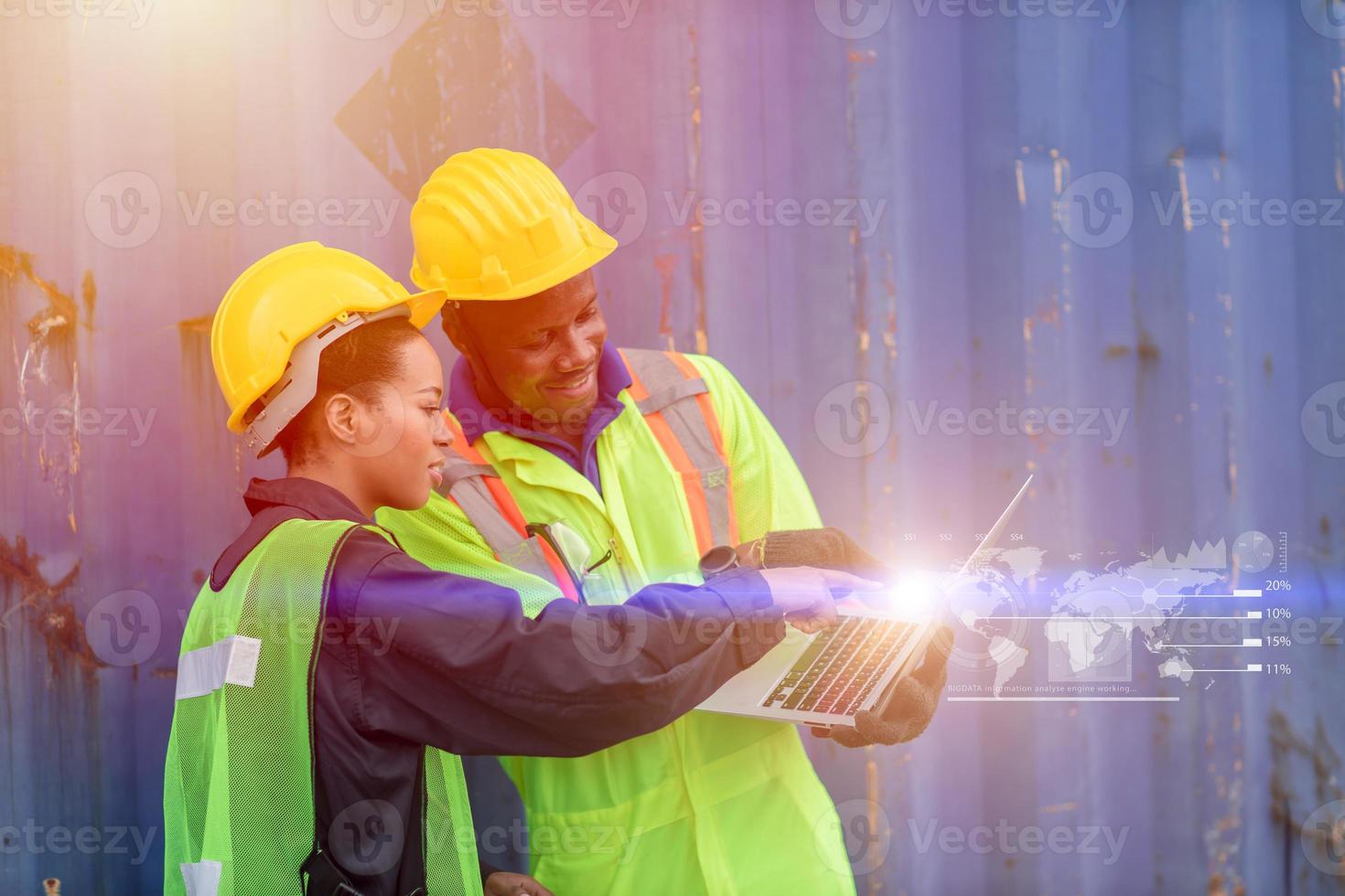 worker with technology for helping work logistic control loading tracking containers at port cargo to trucks for export and import goods around the world concept. photo