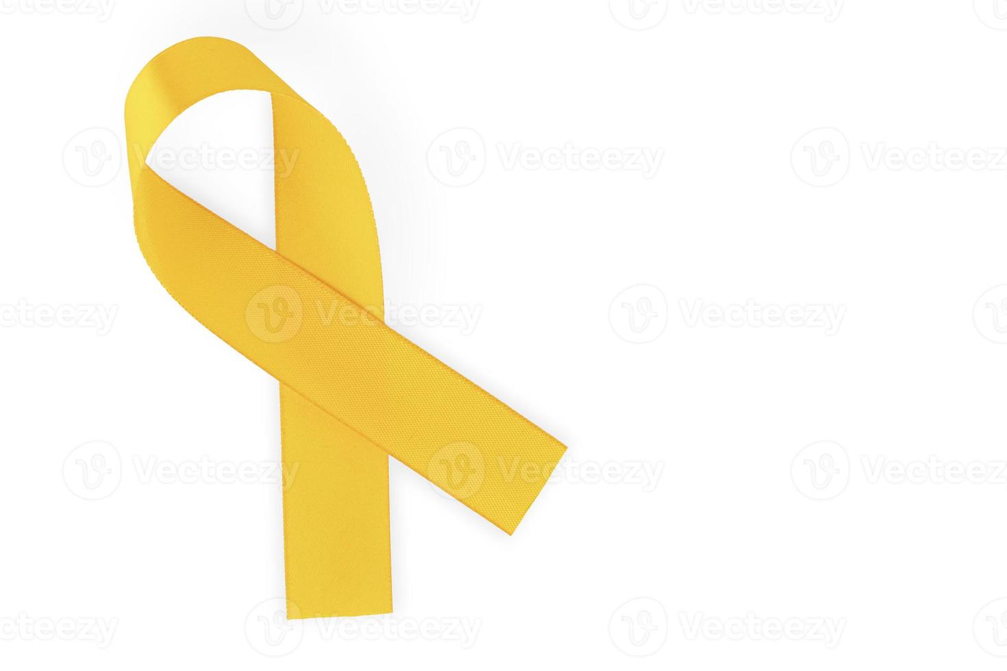 Orange ribbon, symbol of social awareness, isolated on white background, top view. World Cancer Day. copy space. photo