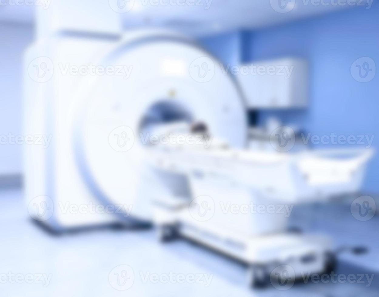 Magnetic resonance imaging MRI, medical diagnostic device, x-ray computer, computed tomography CT scan, axial tomography in a modern clinic. Soft toned blurred background. photo
