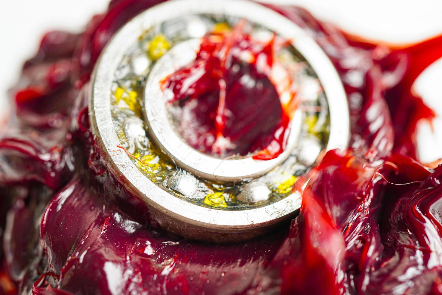 Grease and ball bearing, red excellent water resistance synthetic lithium complex grease for moving path and machinery lubrication for automotive and industrial. photo