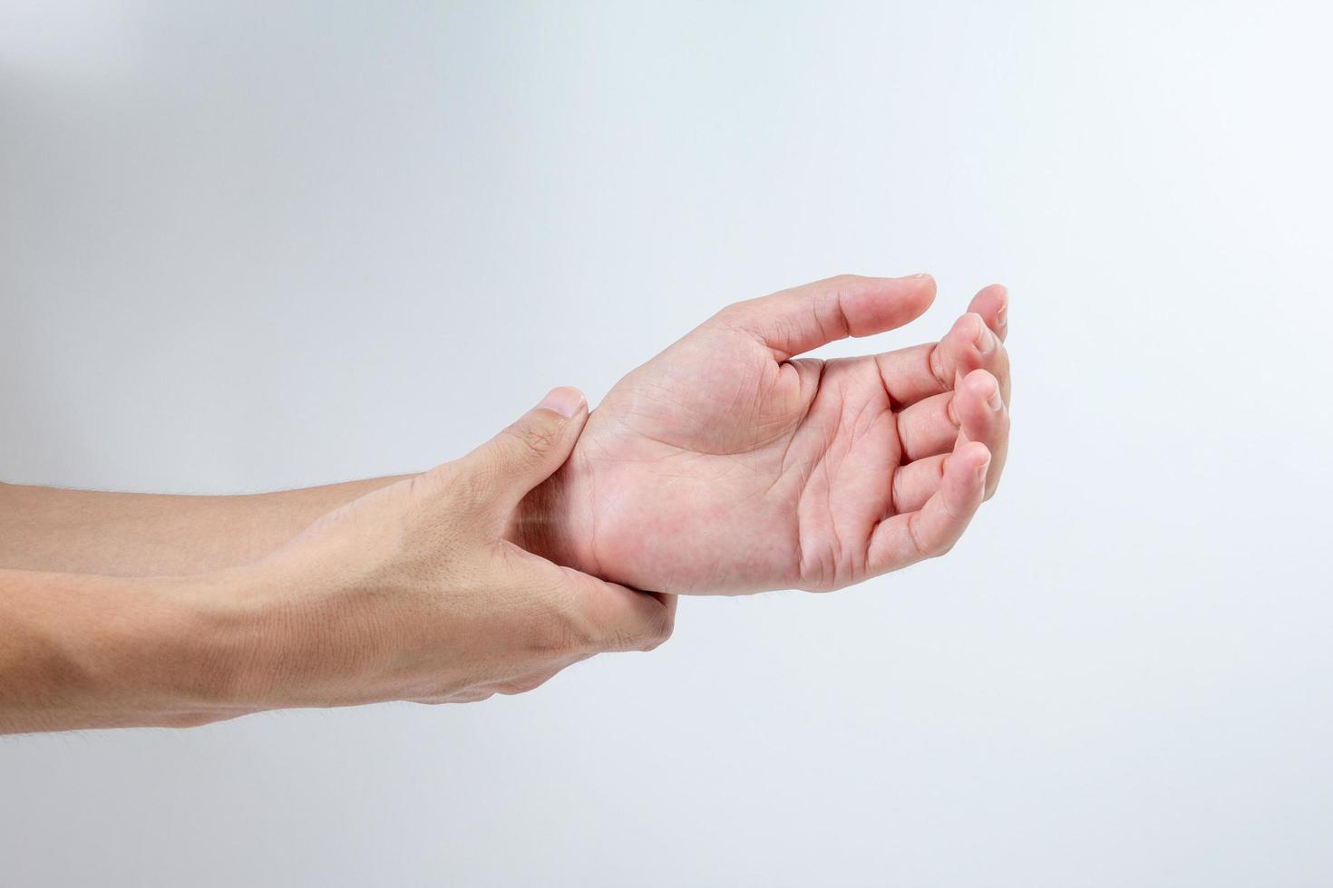 closeup male hand. pain in the joints of the hands photo