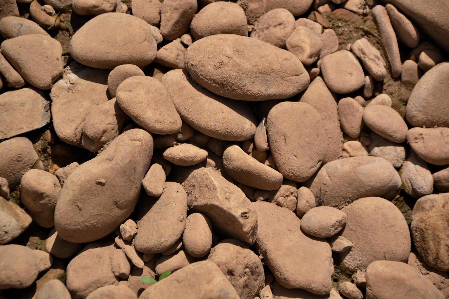 Pile of rounded river stones photo