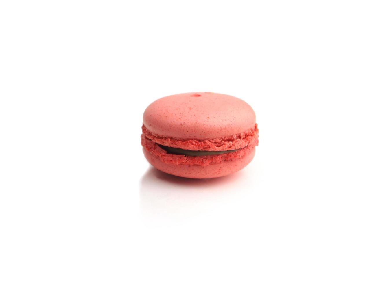 Red French macarons macaroons cake,  delicious sweet dessert on white background, lovely food  concept. photo