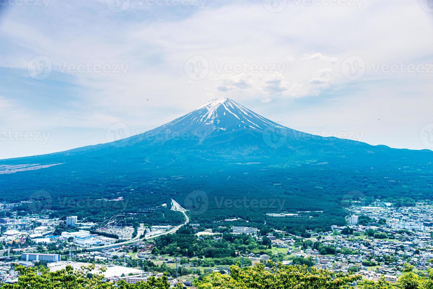 Beautiful Fuji mountain with cloud and blue sky in summer, the famous landmark and attraction place of tourists who have a long holiday in Japan, Lake Kawaguchiko photo