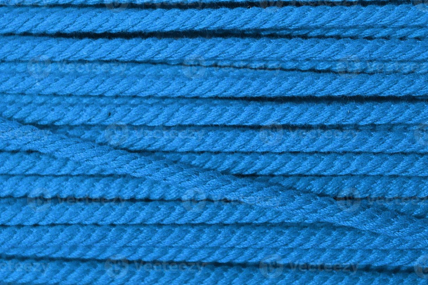 Detailed close up view on samples of cloth and fabrics in different colors found at a fabrics market photo