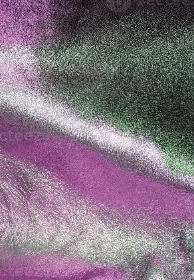 Detailed close up view on samples of cloth and fabrics in different colors found at a fabrics market photo