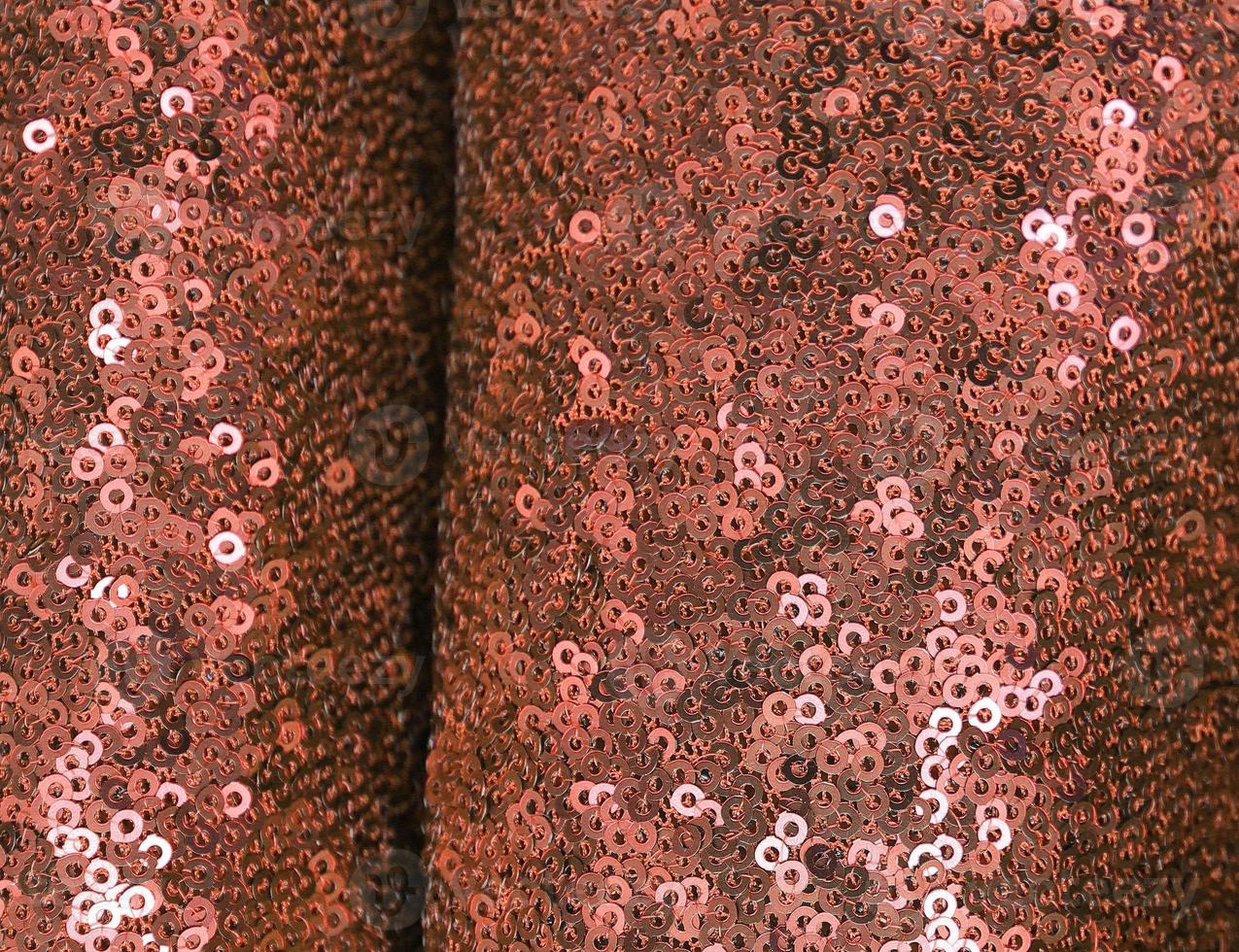 Detailed close up view on samples of cloth and fabrics in different colors found at a fabrics market photo
